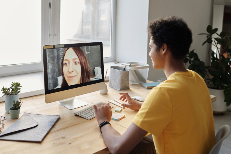 boy-in-yellow-t-shirt-using-imac-4144145