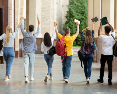 We passed exams. Students raised hands and walking in campus