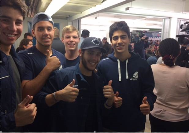 Blues players volunteer at Thanksgiving dinner event at Welcome Hall Mission’s men’s shelter.